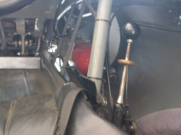 Shifter lever and fire extinguisher.