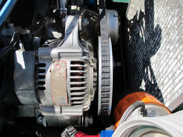 Compact Nippondenso alternator with large pulley.