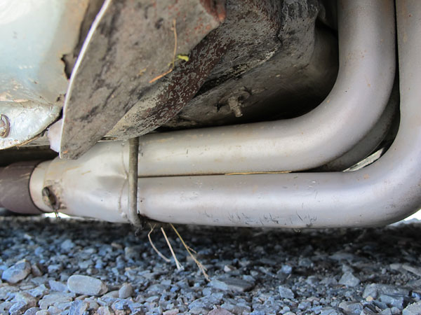 A bung has been welded onto this header collector for installation of an oxygen sensor.