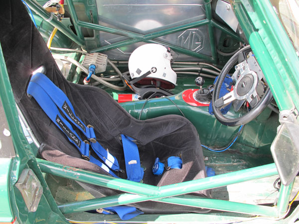 Kirkey aluminum racing seat and Willans six point cam-lock safety harness.