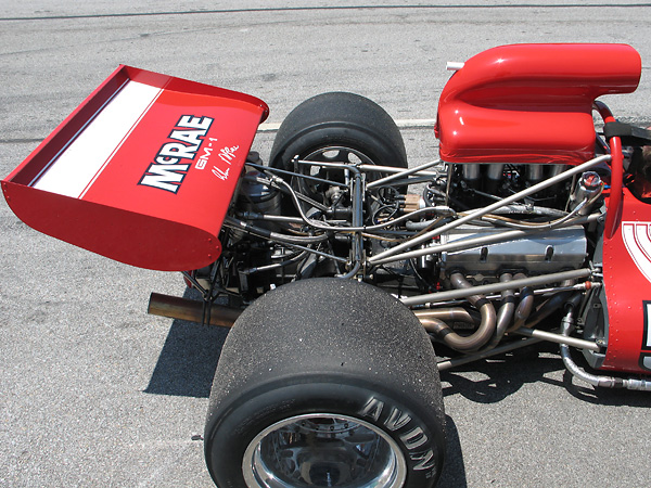 Small block Chevy engine with iron block and four bolt mains, de-stroked to 5.0L.