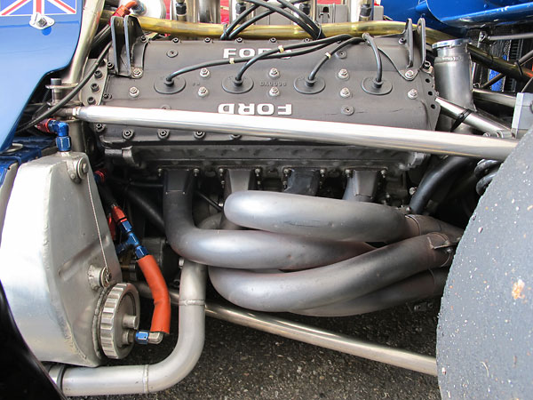 The engine oil reservoir is tucked away out-of-sight, ahead of the engine.