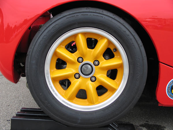 Panasport Racing 13x6 aluminum wheels.