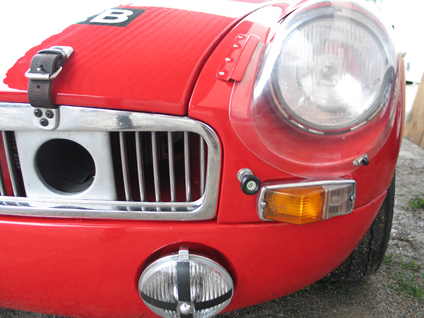 Relocated bonnet release, and leather bonnet hold-down strap.