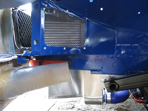 Cooling airflow from the oil coolers is ducted into the wheel wells.