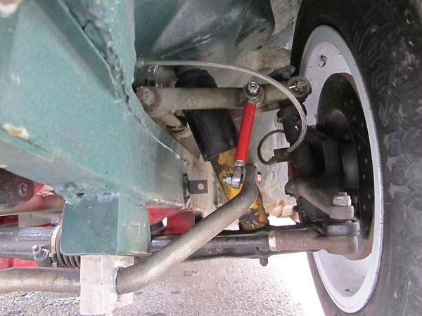 There are no common parts between MGB and MGC front suspensions.