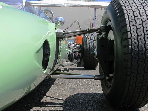 Inboard front suspension and front brakes tucked neatly into wheel cavities.