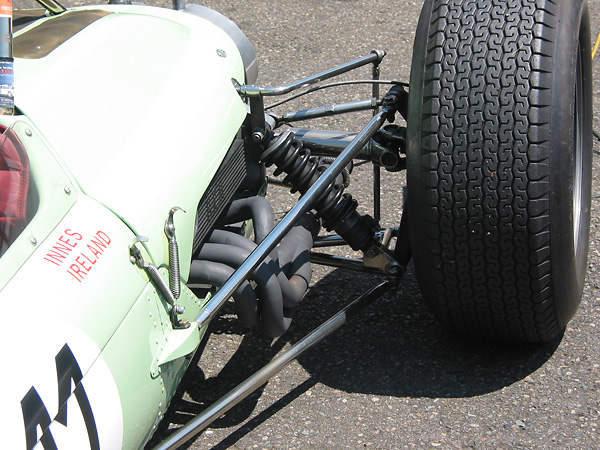 The rear shock absorbers are located forward of the halfshafts.