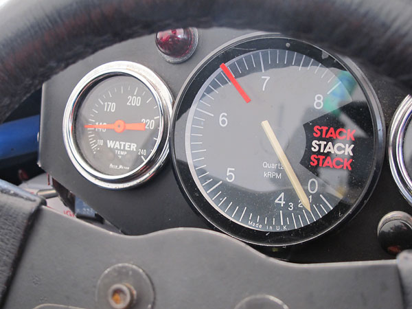 AutoMeter water temperature gauge (110-240F) and Stack Quartz tachometer (0-8000rpm).