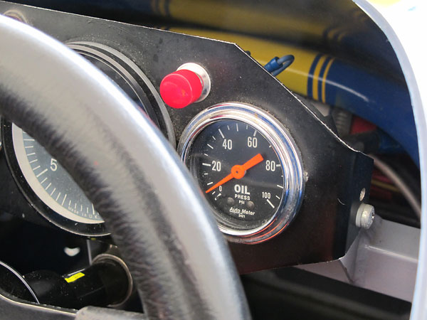 AutoMeter oil pressure gauge (0-100psi).