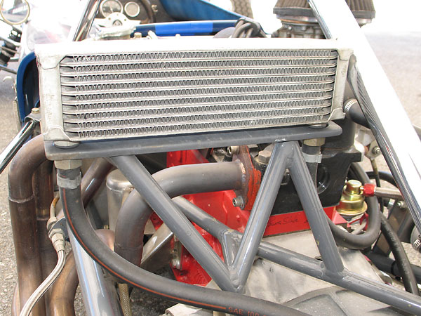 10-row aluminum oil cooler on a robust mounting bracket.