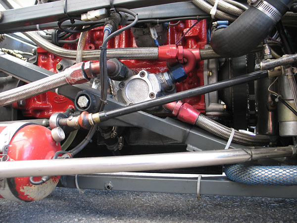 Dry sump lubrication system plumbing, including a special oil pump.