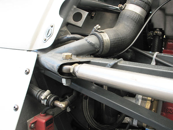 To run engine coolant through square section frame tubes, round tube sections needed to be spliced on.