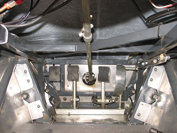 A stout dead pedal and a telescoping steering column.