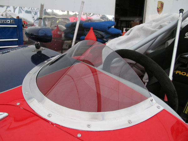 Custom low-profile Perspex wind screen.