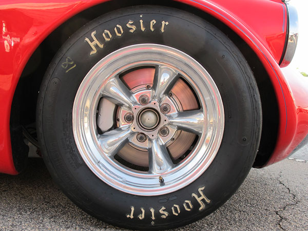 American Racing Torq Thrust II aluminum wheels, with a Ford 5-bolt x 4 inch bolt pattern.