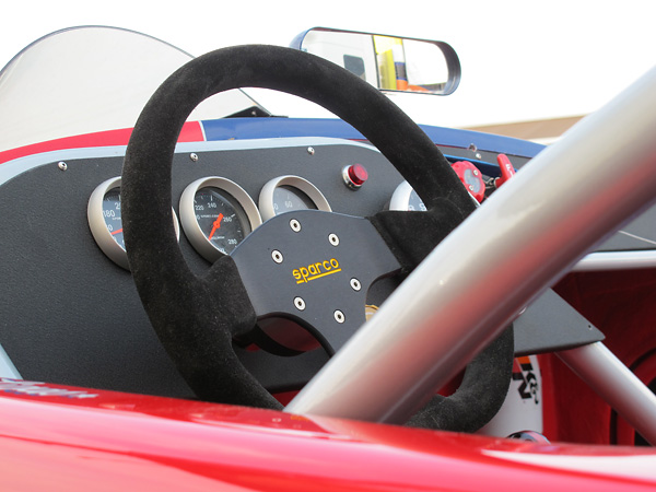 Sparco suede wrapped, D-shaped steering wheel.