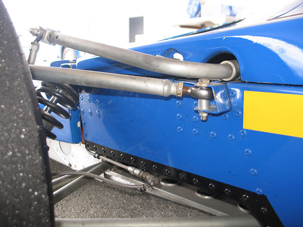 Lola also changed the upper control arm rearward fixings from horizontal to vertical bolts.