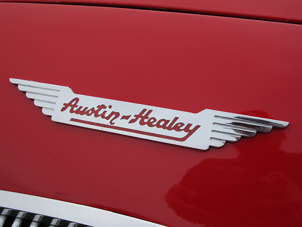 Polished Austin-Healey wings badge.