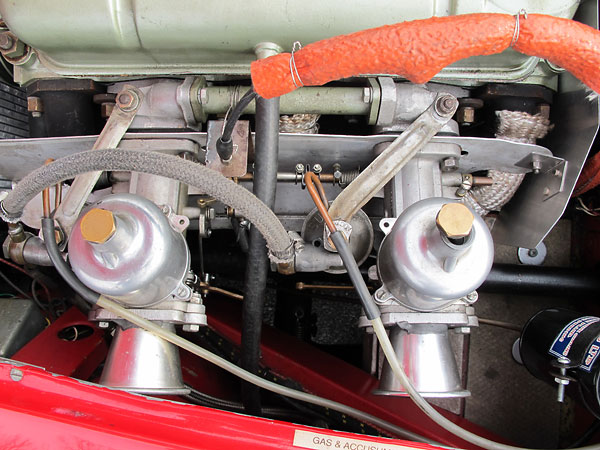 Dual S.U. H6 (1.75) carburetors, with velocity stacks.