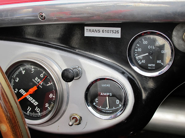 Moroso tachometer (0-11000rpm), Lucas ammeter, and Smiths oil temperature gauge (40-140C).