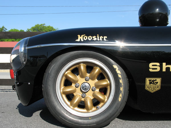 Panasport Racing eight spoke aluminum wheels.