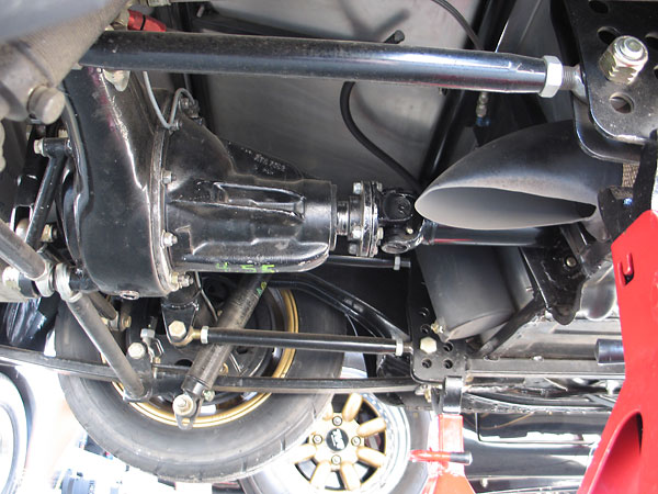 Composite (fiberglass) single-leaf leaf springs, plus adjustable gas shock absorbers.