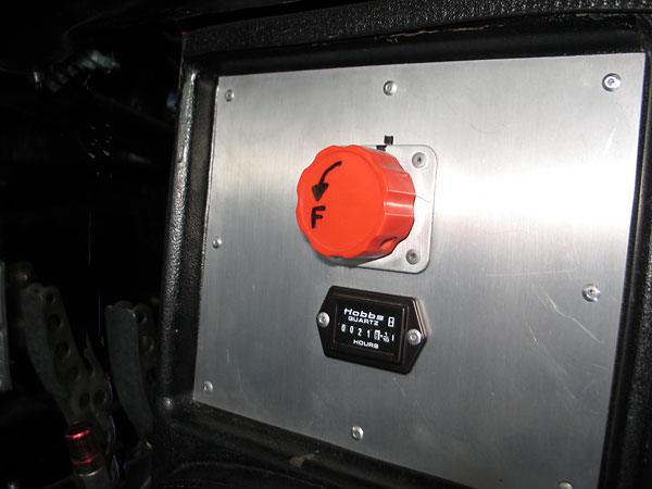 Tilton brake bias adjustment knob. Hobbes engine hour meter.