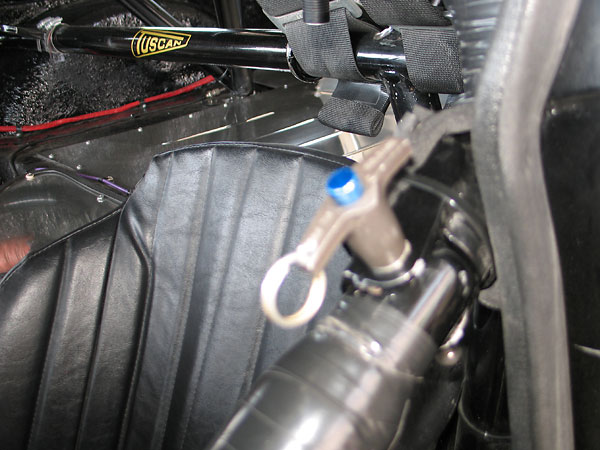 Driver's side door brace is hinged for easier egress. When racing, it's secured in place with a pip pin.