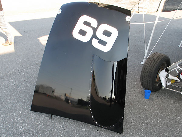 For the restoration, Al Pease leant Mike Adams the original cardboard pattern for cutting the car's number (69).