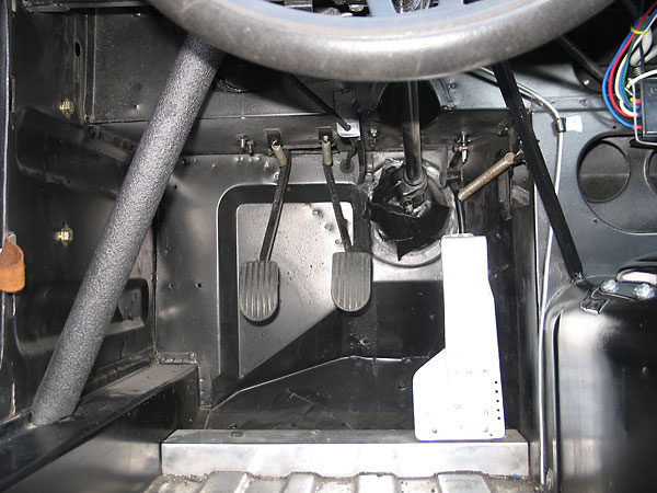 A heel-bar helps the driver keep his feet securely in position relative to the pedals.