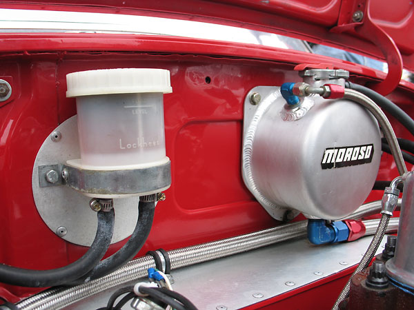 Lockheed brake fluid reservoir and Moroso cooling system expansion tank.