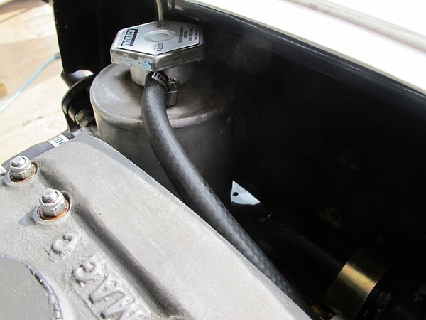 This coolant header tank is more than just a reservoir: coolant swirls within it.
