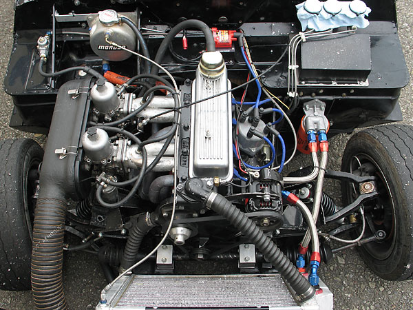 Steering rack reinstalled on aluminum pillow blocks (instead of on rubber mounts, as original.)