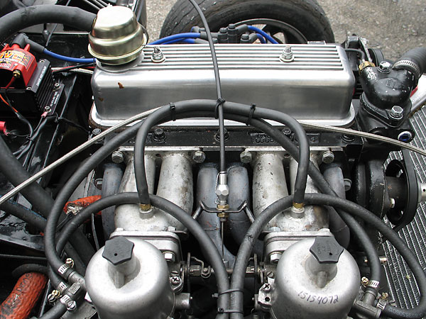 SVRA class rules limit carburetor options. For a 1.3L Spitfire, dual 1.25 inch S.U. carburetors are specified.