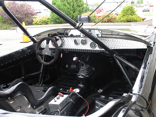 Engine turned aluminum dashboard.