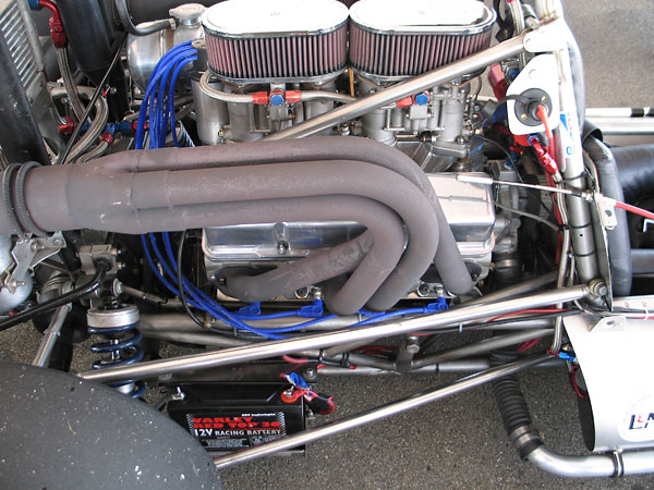 Regular four-into-one small block Chevy headers, installed upside down and reversed side-to-side.