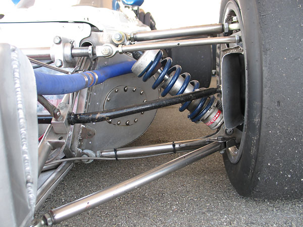 Notice the second (unused) mounting point for the rearward leg of the lower wishbone.