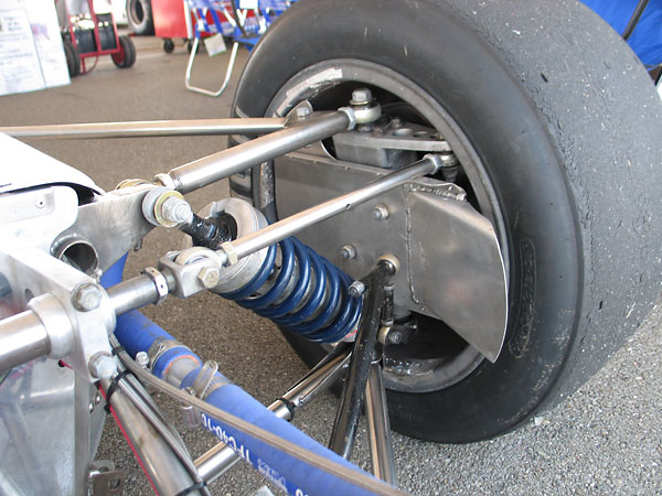 A brake cooling duct hides the Ford Mustang front brake caliper...