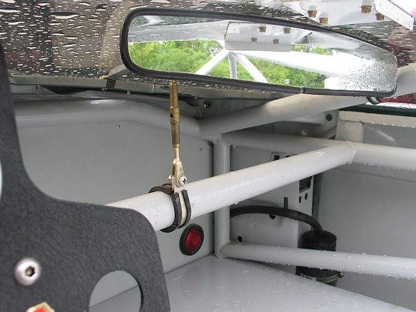 A Sports 2000 style mirror mounted above the windscreen provides a clearer view. 