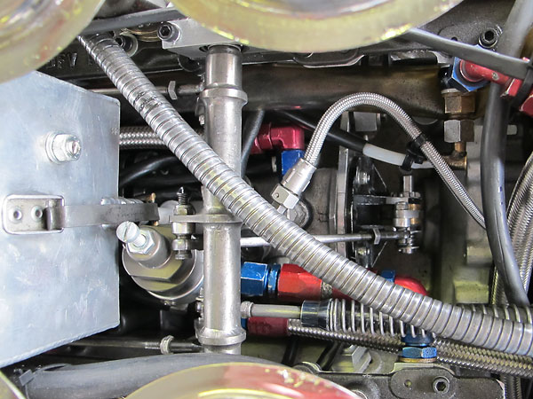 The Lucas Mk1 mechanical fuel injection metering unit is gear driven from off the crankshaft.