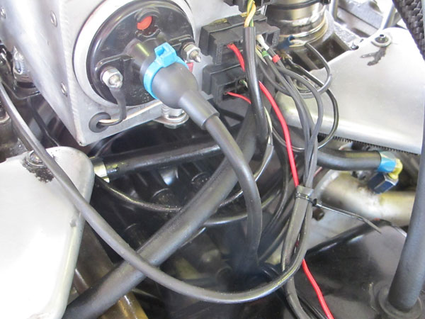 The DFV engine uses a Lucas OPUS (Oscillating Pick-Up System) electronic ignition.