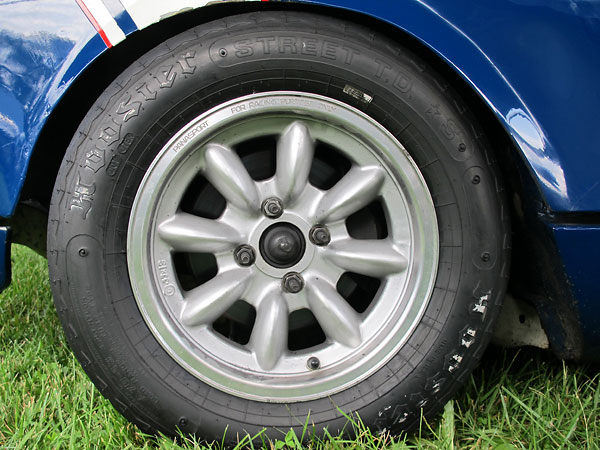Panasport Racing 6-JJx13 wheels and Hoosier Street T.D. - S (A70-13) tires.