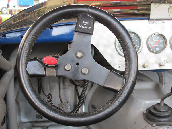 Mountney of Britain leather wrapped steering wheel.