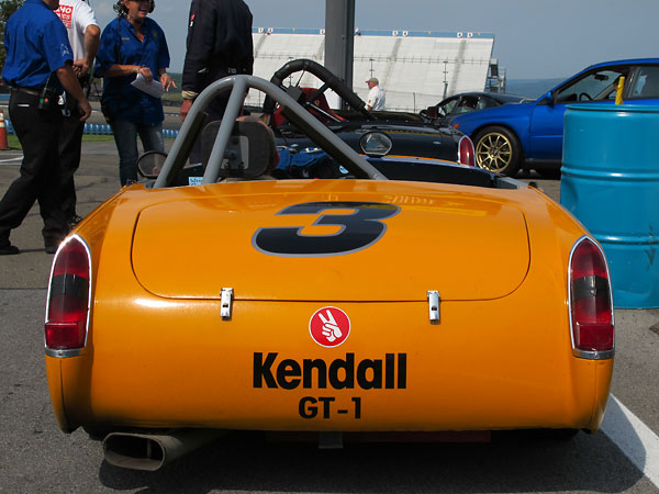 Kendall GT-1 livery. Late model Ford Mustang Grabber Orange paint.