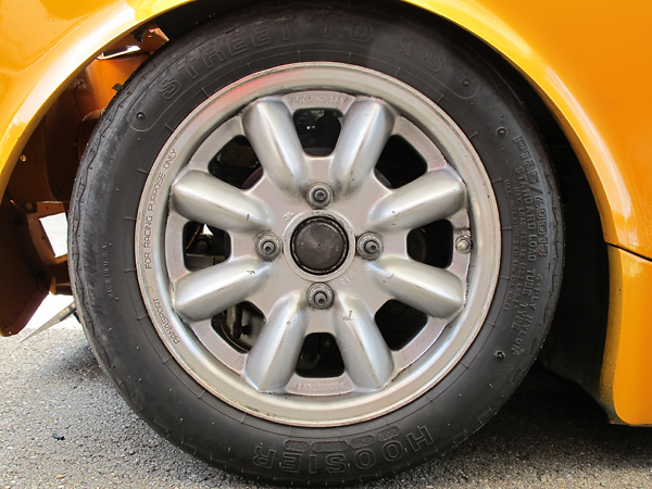Panasport Racing 13x6 aluminum wheels and Hoosier Street T.D. *S P185/60D13 racing tires.