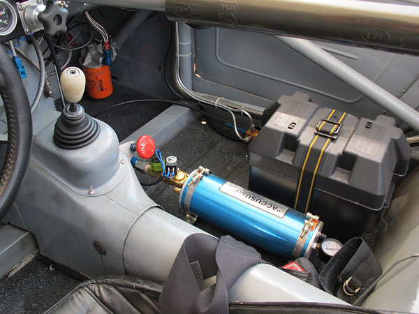 This Accusump oil accumulator is electrically actuated from a toggle switch on the dashboard.