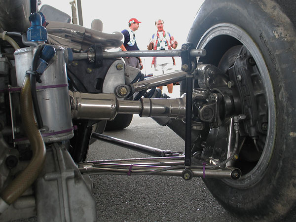 Fabricated steel rear suspension upright with outboard mounted AP 6-pot calipers with ventilated rotors.