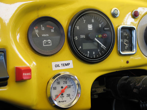 Voltmeter, Sunpro oil temp gauge, and SPA Design tach with programmable shift light and telltale.