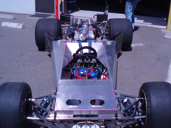 March 741 aluminum tub: wide at the engine bulkhead, tapering through the cockpit area.